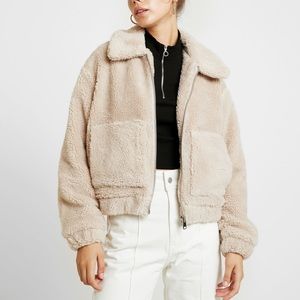 urban outfitters cream teddy coat